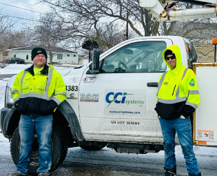 CCI Employees standing by CCI Truck CCI Employees standing by CCI Truck